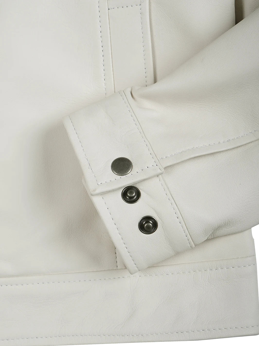 Close-up of a white jacket with buttons on a white background
